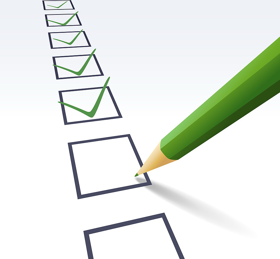 Häkchen auf einer Checkliste Häkchen auf einer Checkliste